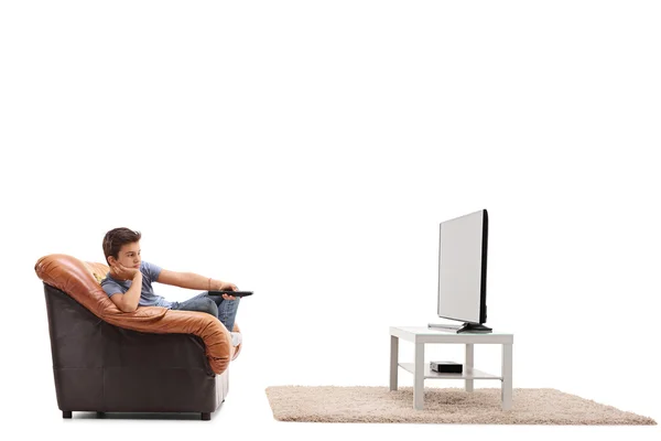 Bored little boy watching TV — Stock Photo, Image