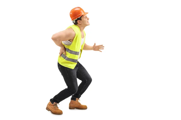 Trabalhador do sexo masculino com dor nas costas — Fotografia de Stock