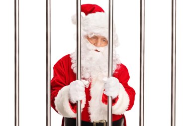 Santa Claus behind bars in a prison clipart