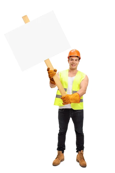 Worker holding a blank signboard — Stock Photo, Image