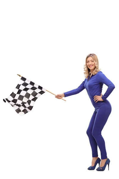 Atractiva mujer ondeando una bandera de carrera — Foto de Stock