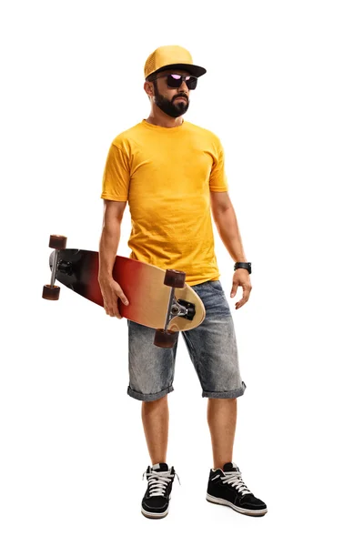 Hombre fresco sosteniendo un longboard — Foto de Stock