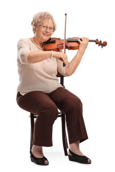 Äldre kvinnlig violinist i en violin — Stockfoto