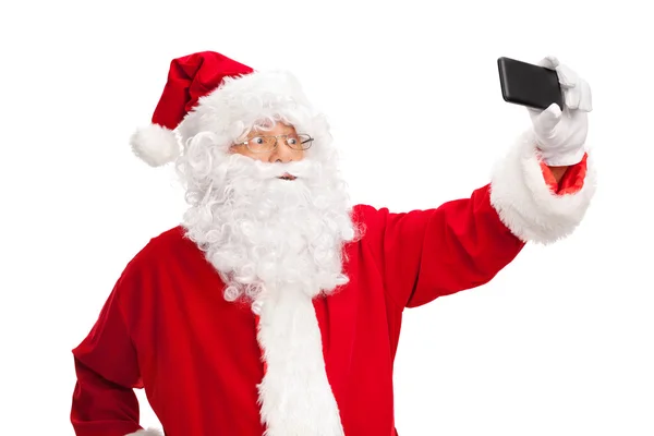 Papai Noel tirando uma selfie — Fotografia de Stock