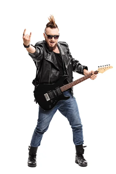 Punk guitarist making a rock sign — Stock Photo, Image