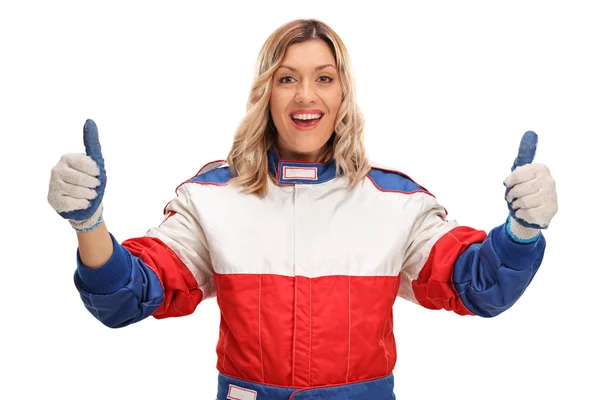 Female race driver making a thumbs up gesture — Stock Photo, Image