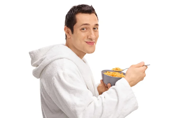 Guy granen eten uit een kom — Stockfoto