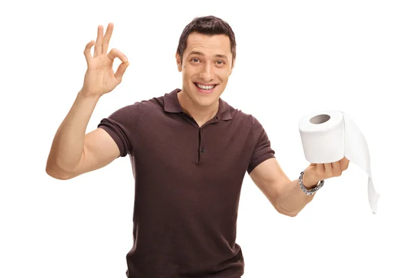 Mann mit Toilettenpapierrolle — Stockfoto