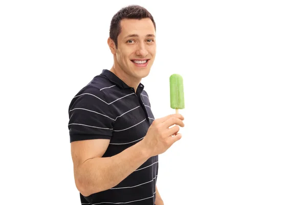 Young man having an ice cream — Stock Photo, Image