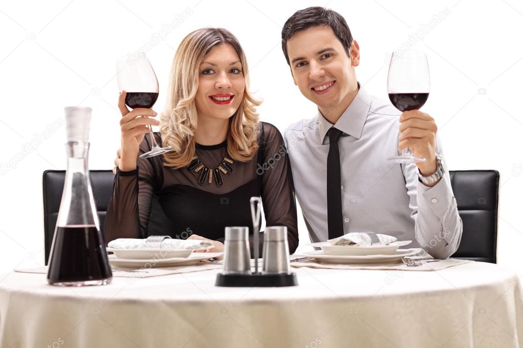 Man and woman on a date posing together