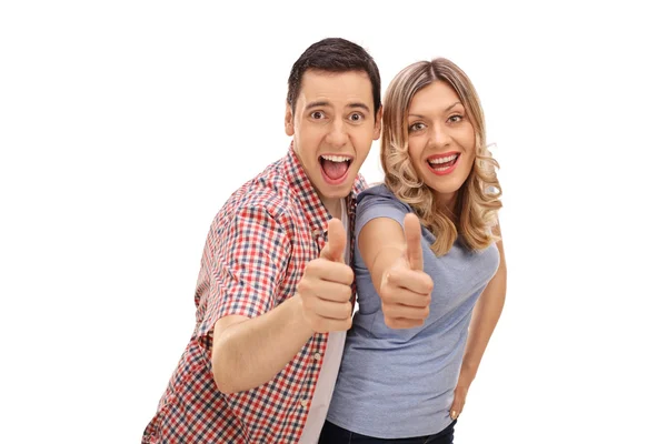 Happy couple giving a thumb up — Stock Photo, Image