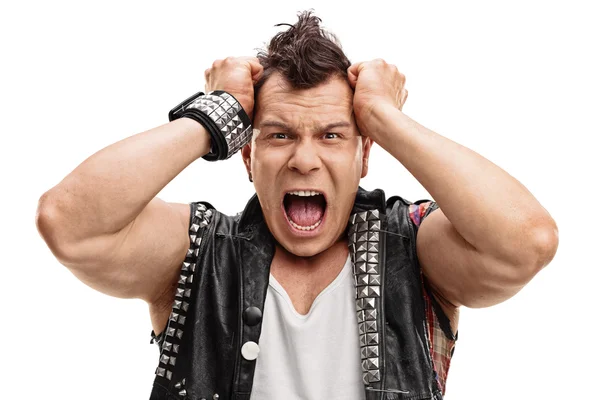 Angry punker with his hands on his head — Stock Photo, Image