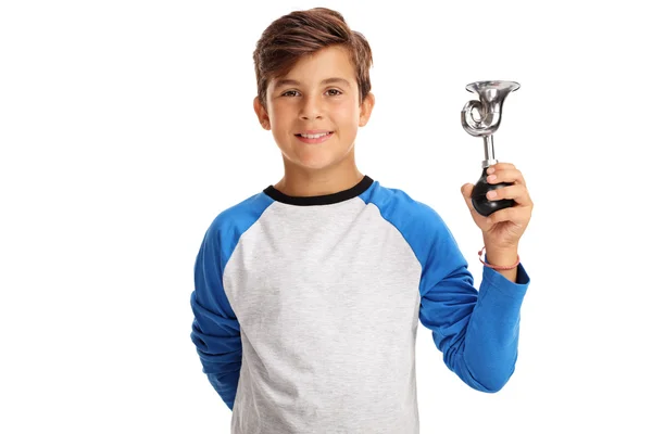 Ragazzo sorridente che tiene un piccolo corno — Foto Stock