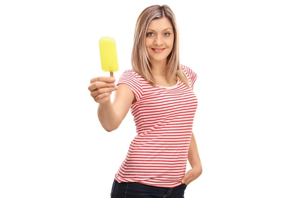 Blond woman offering an ice cream — Stock Photo, Image