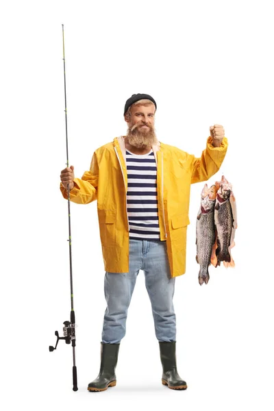 Full Längd Porträtt Fiskare Gul Regnrock Med Fiskespö Och Fisk — Stockfoto