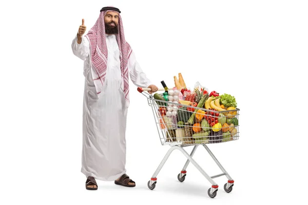 Araber Mit Vollem Einkaufswagen Steht Isoliert Auf Weißem Hintergrund Und — Stockfoto