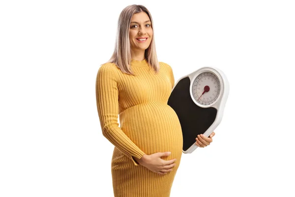 Gravid Kvinna Ler Och Håller Vikt Skala Isolerad Vit Bakgrund — Stockfoto