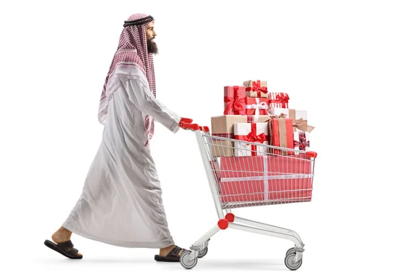 Vollständige Profilaufnahme Eines Arabischen Mannes Der Einen Einkaufswagen Mit Geschenken — Stockfoto