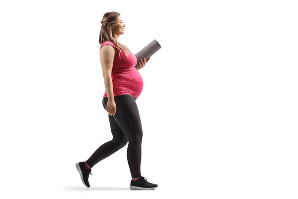 Volledig Profiel Shot Van Een Zwangere Vrouw Met Een Trainingsmat — Stockfoto