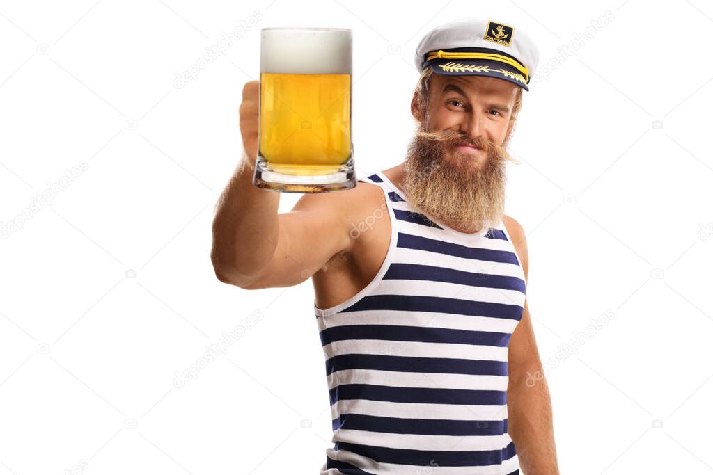 Bearded guy sailor toasting with a mug of beer isolated on white background