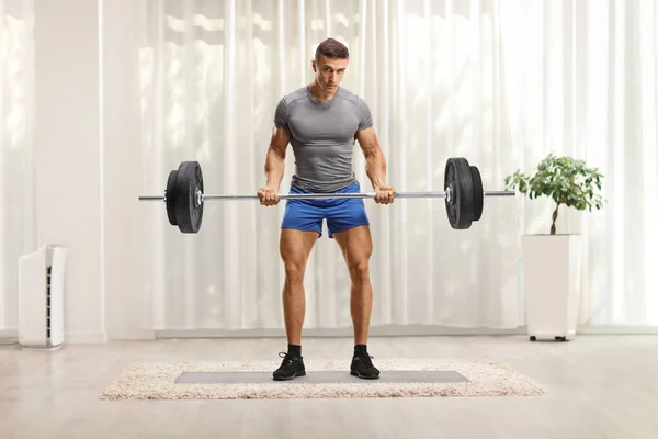 Ganzkörperporträt Eines Kräftigen Muskulösen Jungen Mannes Sportbekleidung Der Hause Gewichte — Stockfoto