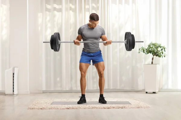 Ganzkörperporträt Eines Fitten Mannes Sportbekleidung Der Hause Gewichte Stemmt — Stockfoto