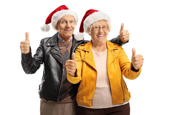Счастливые Пожилые Мужчина Женщина Кожаных Куртках Шляпы Санта Клауса Жесты — стоковое фото