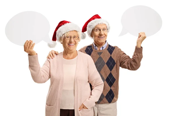 Elderly People Speech Bubbles Looking Camera Wearing Santa Claus Hats — Stock Photo, Image