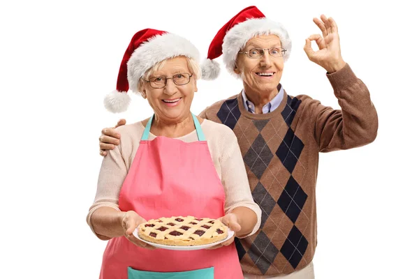 Elderly Man Woman Freshly Baked Pie Wearing Christmas Hats Isolated — Stock Photo, Image