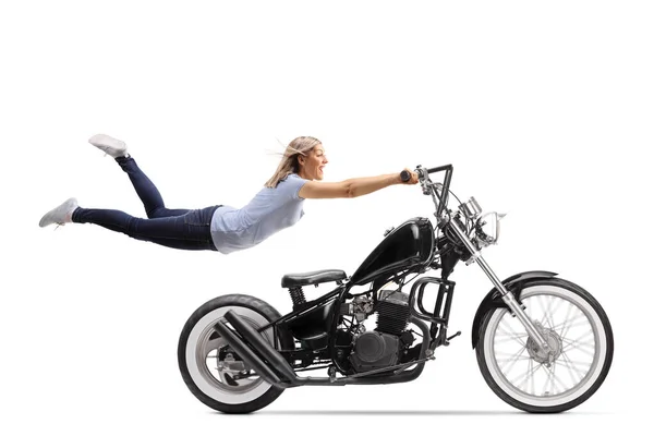 Young Woman Flying Holding Black Chopper Motorbike Isolated White Background — Stock Photo, Image