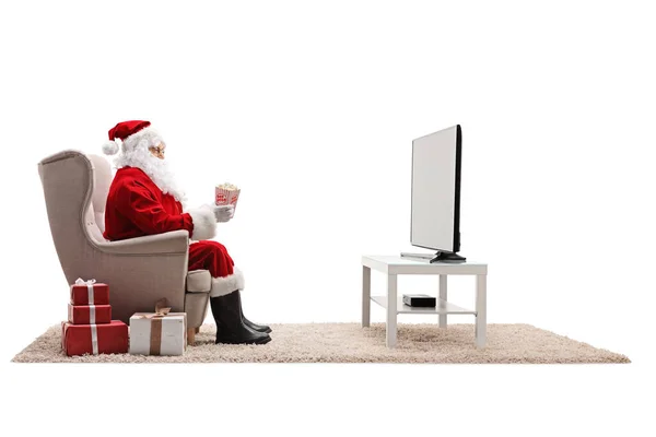 Φωτογραφία Προφίλ Του Santa Claus Στο Σπίτι Κάθεται Μια Πολυθρόνα — Φωτογραφία Αρχείου