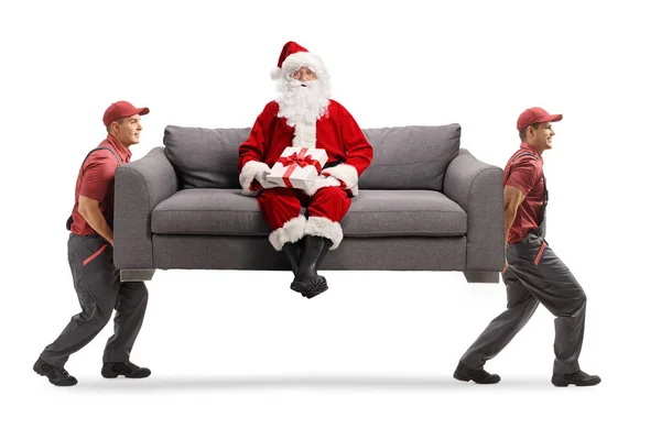 Movers Carrying Sofa Santa Claus Sitting Holding Gift Box Isolated — Stock Photo, Image