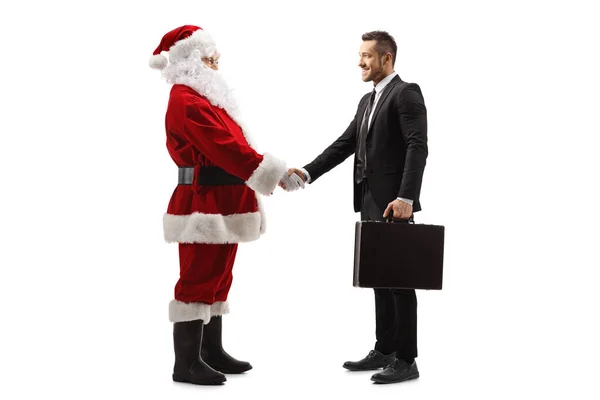 Ganzseitige Profilaufnahme Des Weihnachtsmannes Beim Händeschütteln Mit Einem Auf Weißem — Stockfoto
