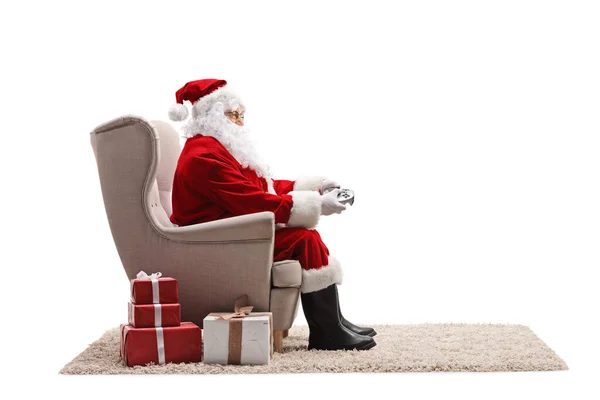 Santa Claus Sitting Armchair Holding Joystick Isolated White Background — Stock Photo, Image