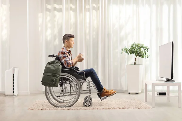 Plan Complet Profil Jeune Homme Fauteuil Roulant Avec Une Tasse — Photo