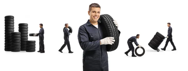 汽车修理厂 人员携带白色背景隔离的汽车轮胎 — 图库照片
