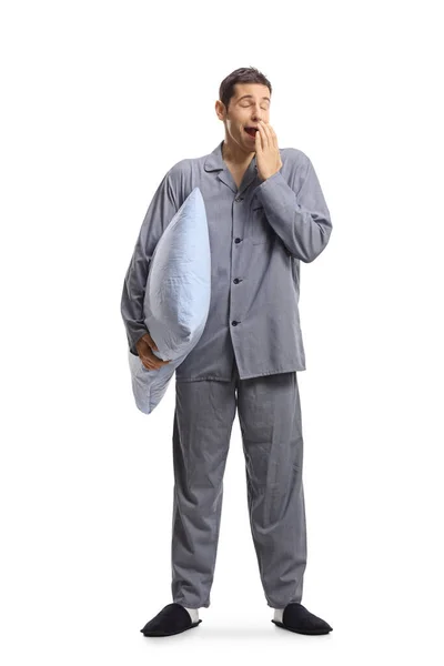 Full Length Portrait Man Pajamas Yawning Holding Pillow Isolated White — Stock Photo, Image