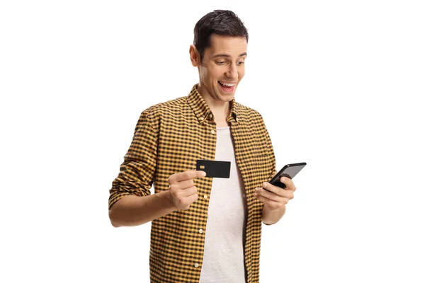 Giovane Uomo Casual Con Telefono Cellulare Carta Credito Isolato Sfondo — Foto Stock