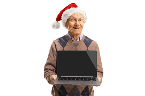 Älterer Mann Mit Weihnachtsmütze Hält Einen Laptop Der Hand Und — Stockfoto