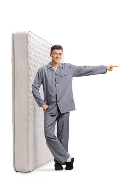 Full Length Portrait Male Teenager Pajamas Bed Mattress Standing Pointing — Stock Photo, Image