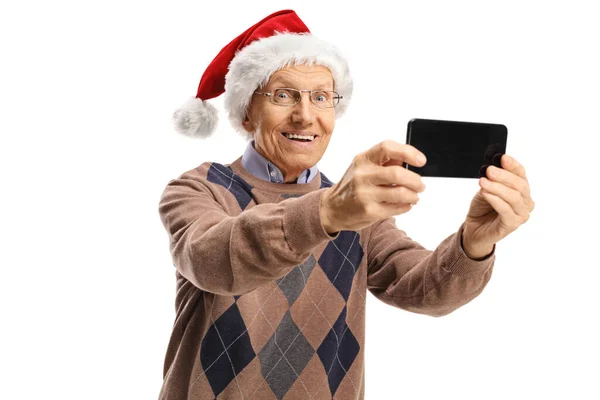 Äldre Man Med Tomte Claus Hatt Ett Foto Med Mobiltelefon — Stockfoto