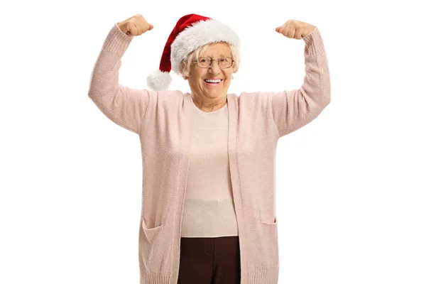 Mulher Madura Alegre Mostrando Músculos Vestindo Chapéu Natal Santa Isolado — Fotografia de Stock