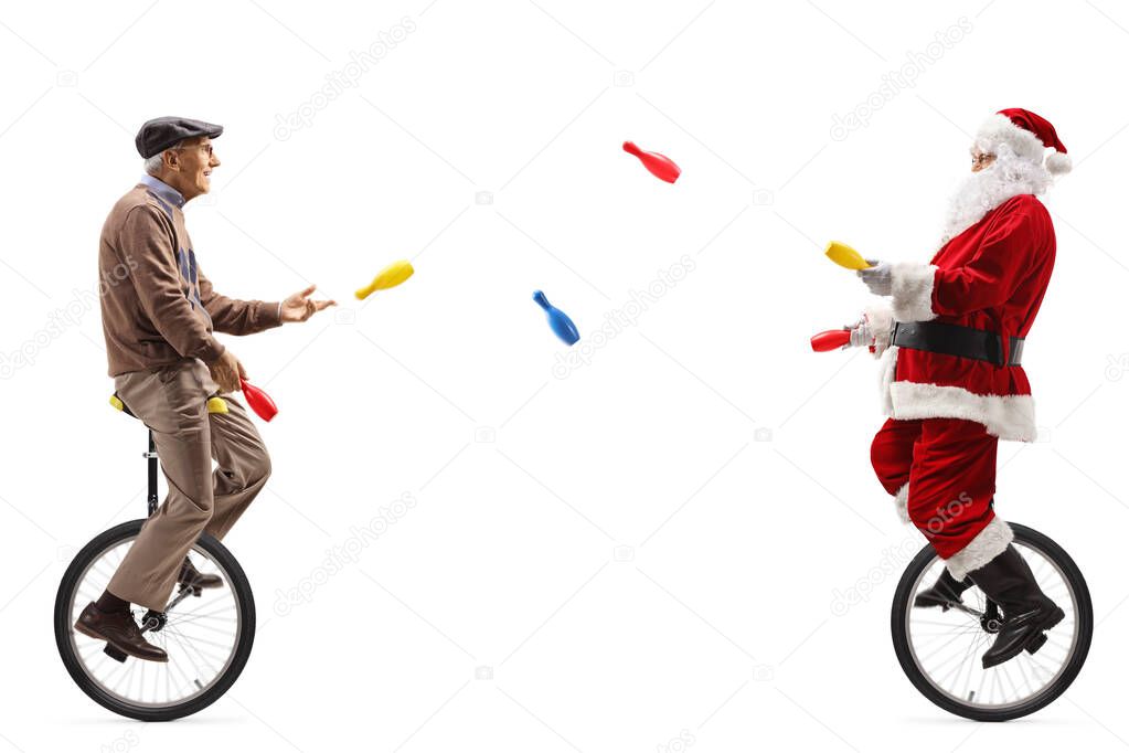 Elderly man and Santa claus on unicycles juggling isolated on white background
