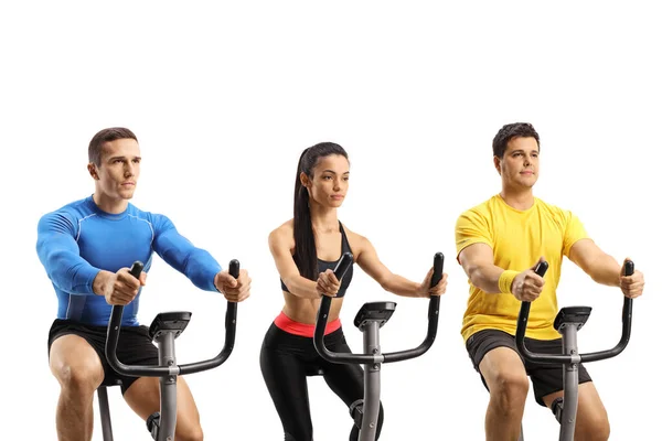 Young People Spinning Class Exercising Stationary Bikes Isolated White Background — Stock Photo, Image