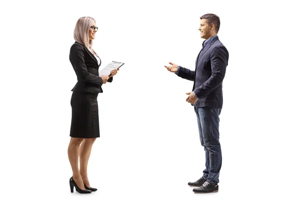 Full Length Profile Shot Man Talking Businesswoman Holding Clipboard Isolated — Stock Photo, Image