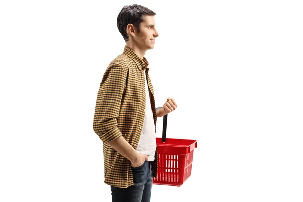 Profil Homme Dans Supermarché Portant Panier Rouge Regardant Des Produits — Photo