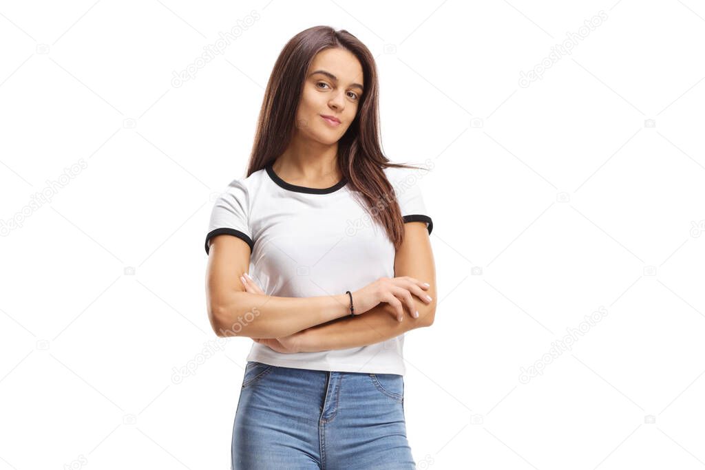 Casual young female standing and looking at the camera isolated on white background