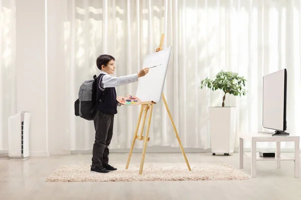 Schoolboy Using Easel Painting Canvas Room — Stock Photo, Image