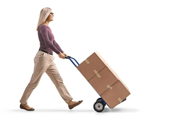 Full Length Profile Shot Woman Walking Pushing Hand Truck Pile — Stock Photo, Image