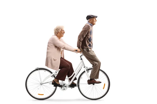 Ηλικιωμένη Γυναίκα Καβάλα Ένα Ηλικιωμένο Ποδήλατο Απομονωμένη Λευκό Φόντο — Φωτογραφία Αρχείου